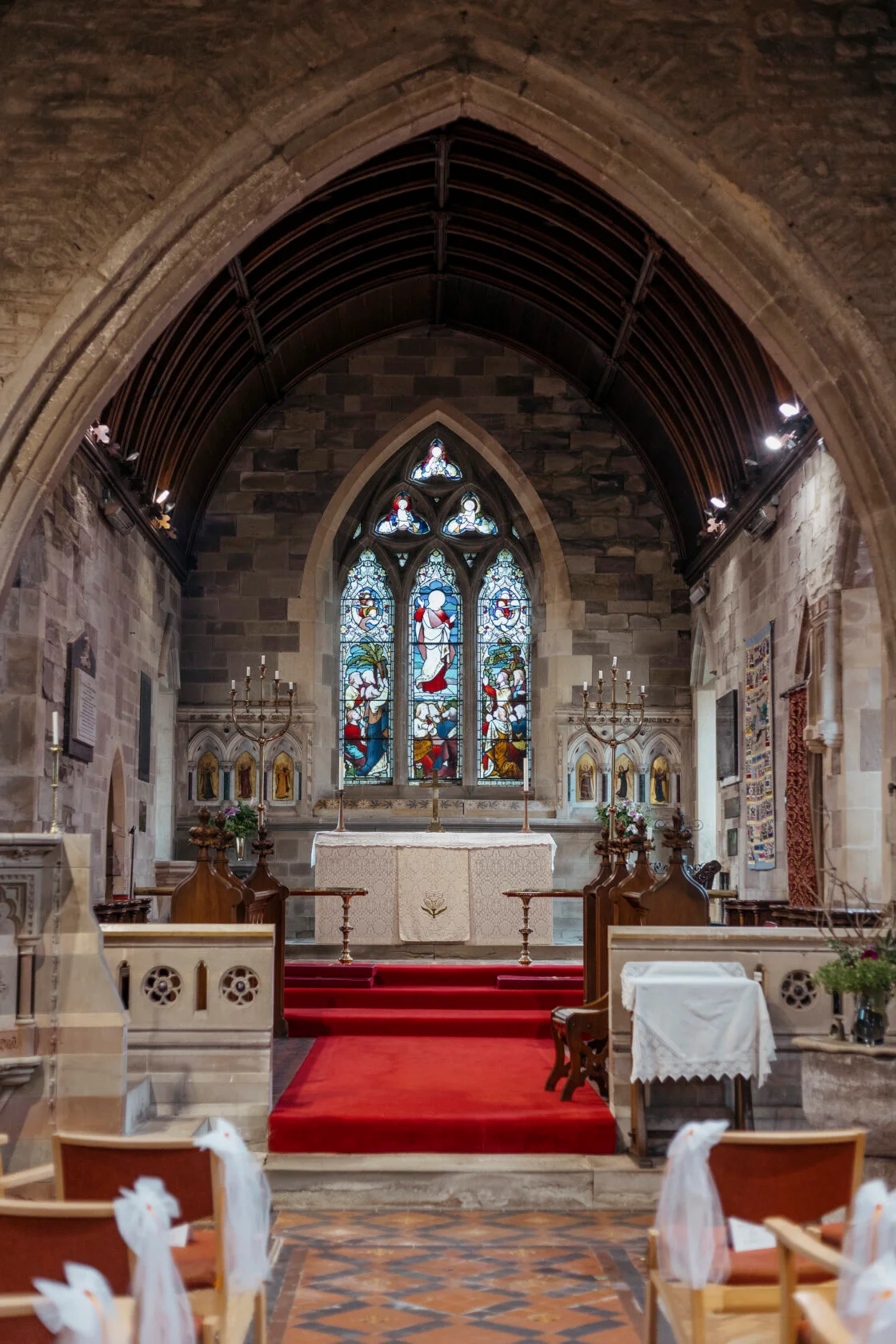 Historic church interior prepared for a wedding in Powys