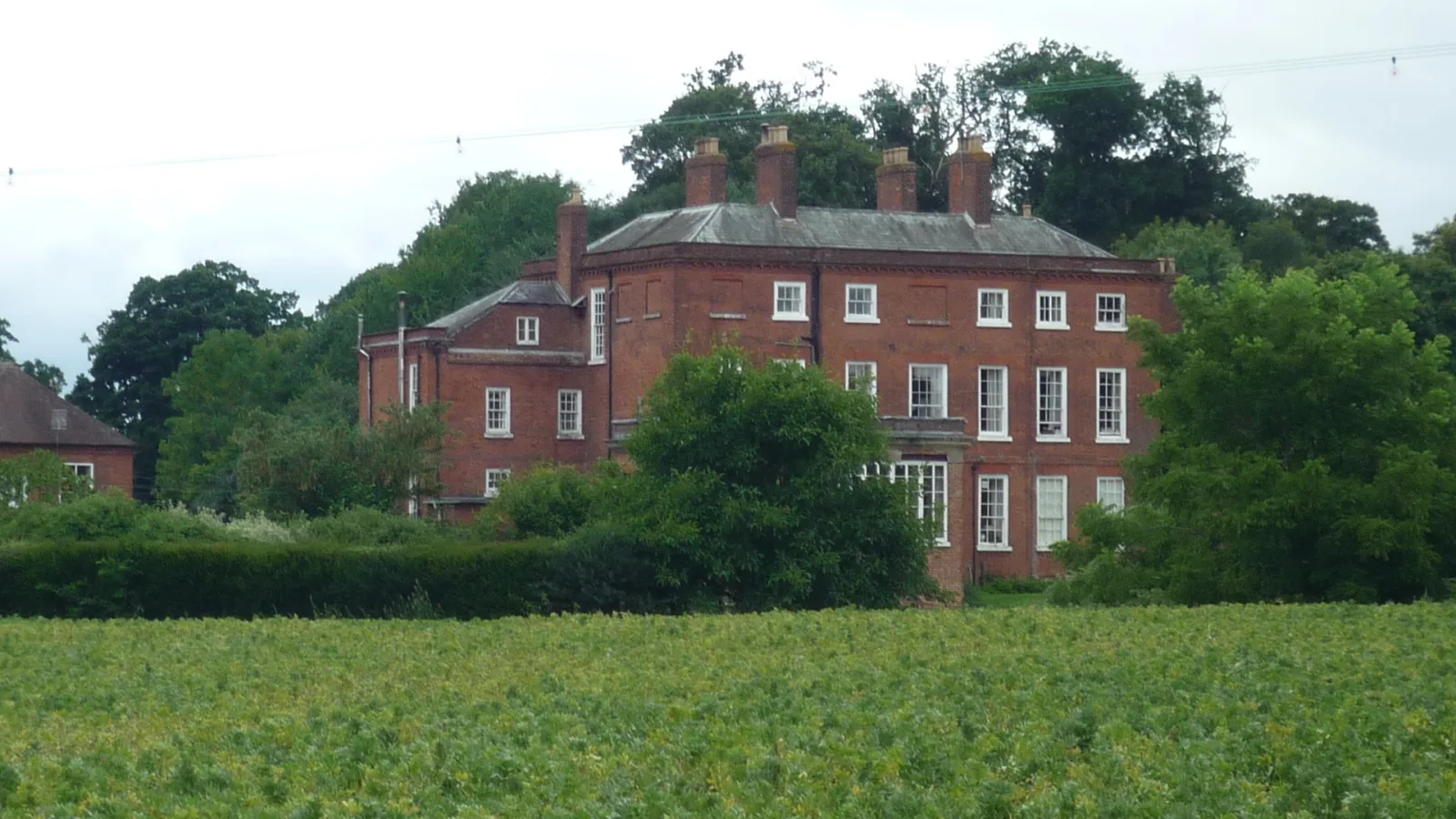 Georgian exterior of Delbury Hall in the Shropshire countryside